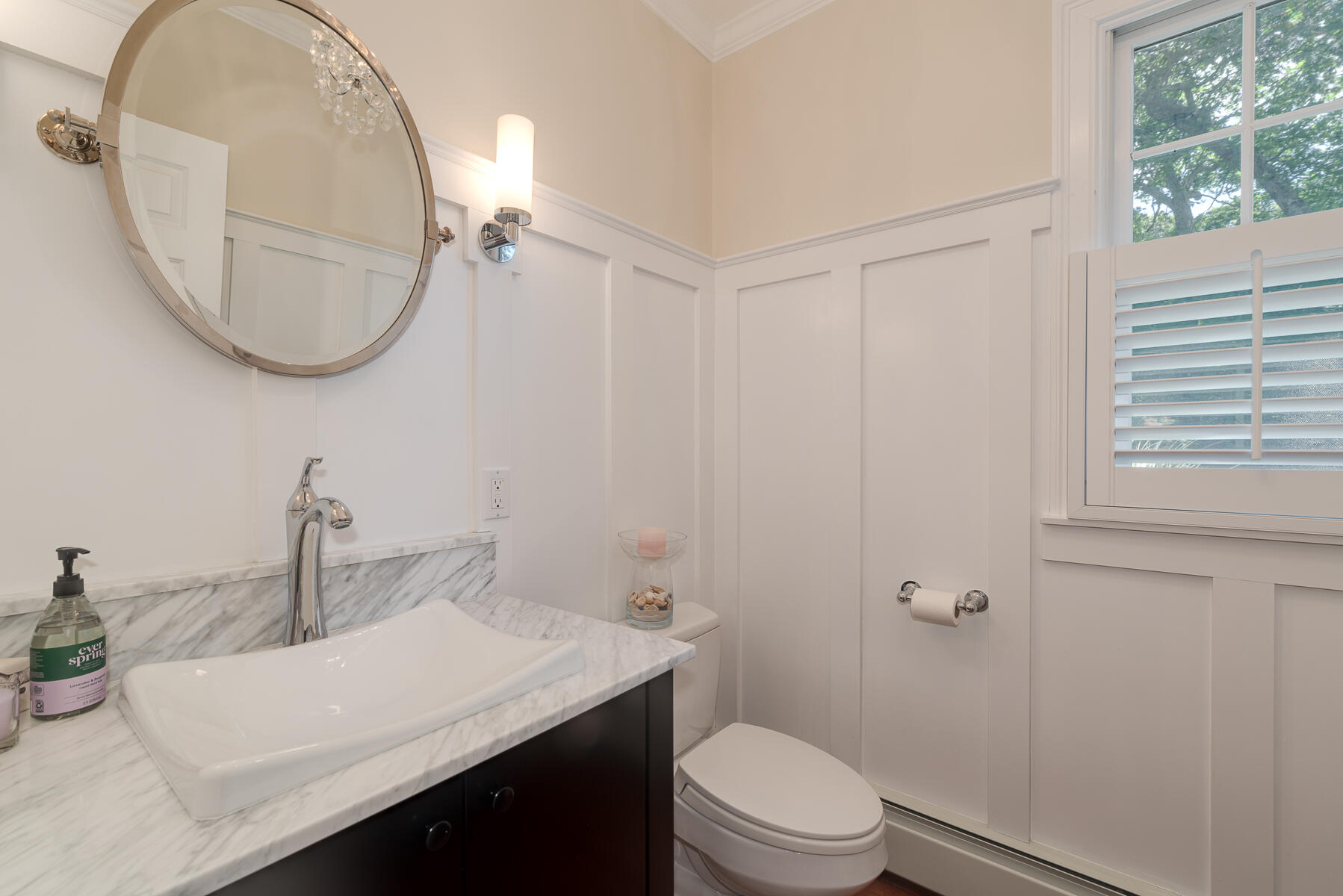 106 Scraggy Neck Road Cataumet, MA 02534 - Photo 8 of 43 a bathroom with a sink a toilet and a mirror