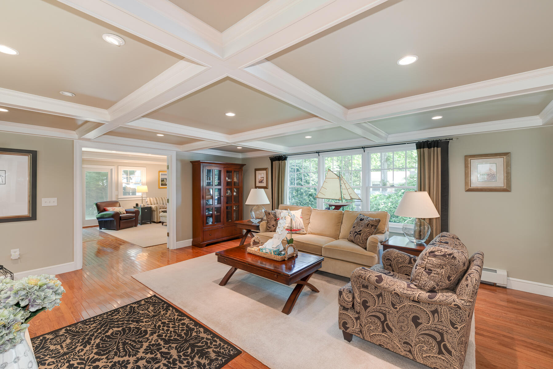 106 Scraggy Neck Road Cataumet, MA 02534 - Photo 9 of 43 a living room with furniture hard wood floor and a rug