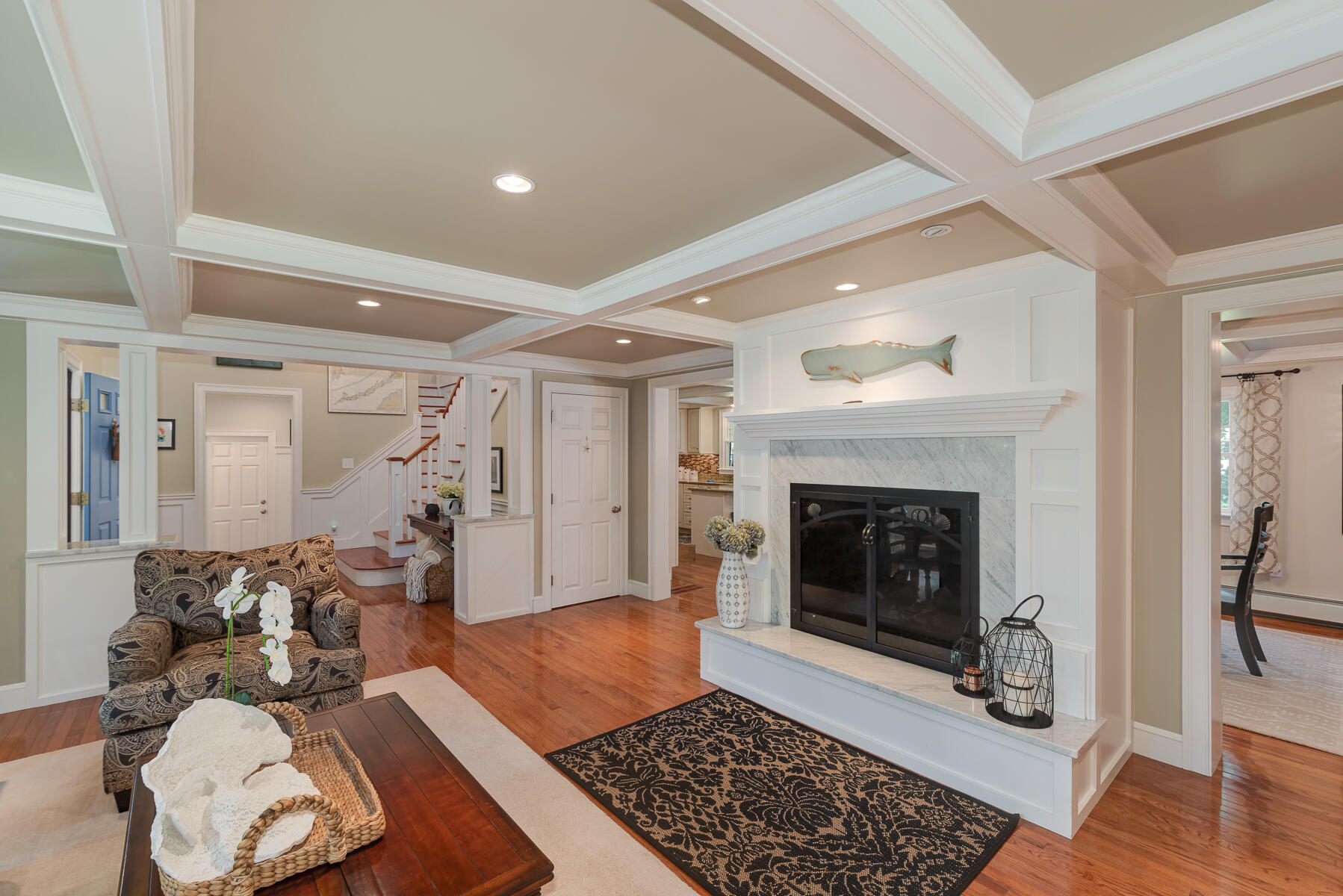 106 Scraggy Neck Road Cataumet, MA 02534 - Photo 10 of 43 a living room with furniture and a fireplace