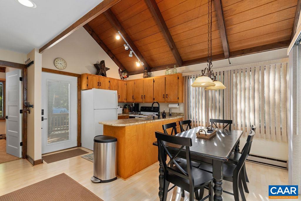 15 Shagbark Lane Roseland, VA 22967 - Photo 11 of 41 a view of a dining room with furniture window and wooden floor