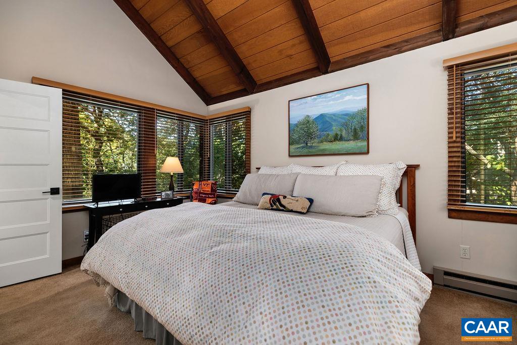 15 Shagbark Lane Roseland, VA 22967 - Photo 23 of 41 a bedroom with bed and large windows