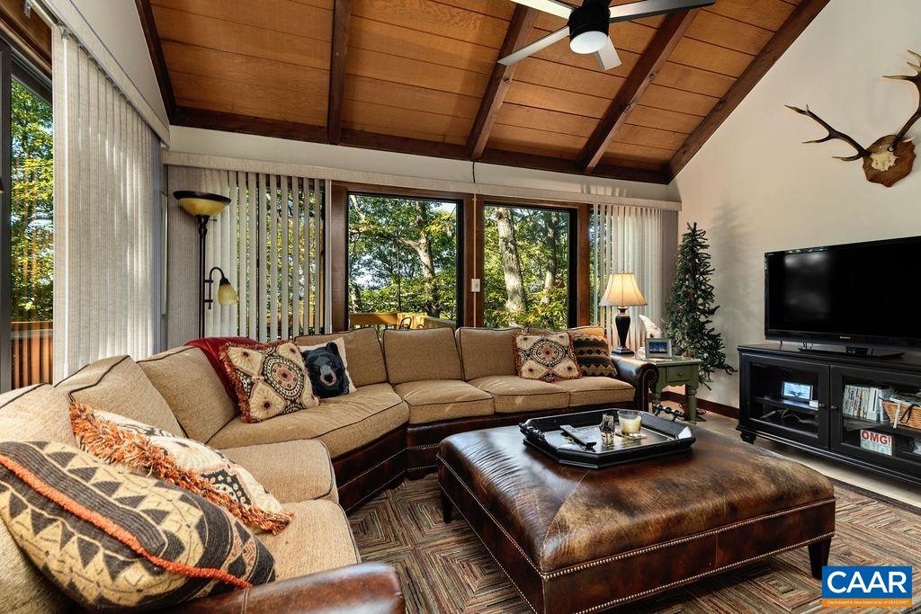15 Shagbark Lane Roseland, VA 22967 - Photo 8 of 41 a living room with furniture and a flat screen tv