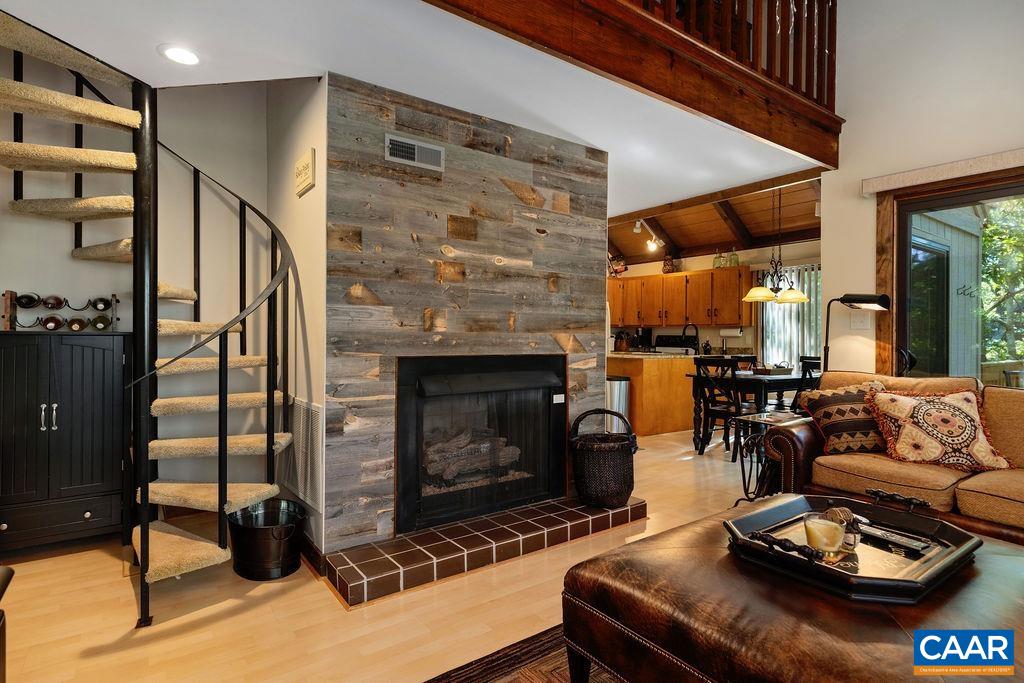 15 Shagbark Lane Roseland, VA 22967 - Photo 9 of 41 a living room with furniture and a fireplace