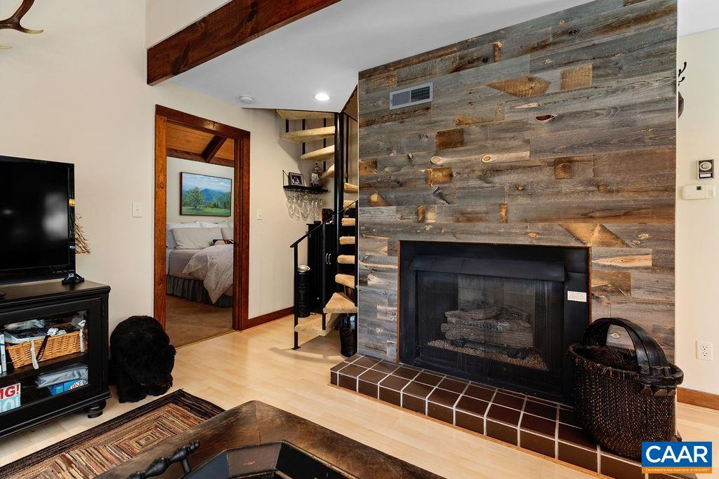 15 Shagbark Lane Roseland, VA 22967 - Photo 10 of 41 a living room with furniture and a fireplace