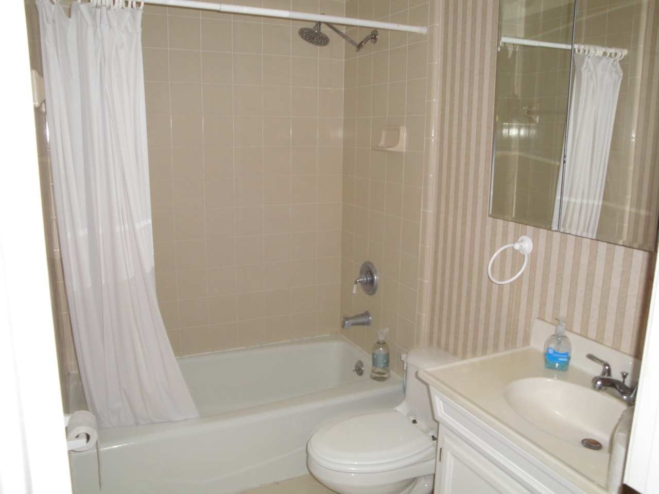 1908 First Street Neptune Beach, FL 32266 - Photo 8 of 9 a bathroom with a sink toilet and shower