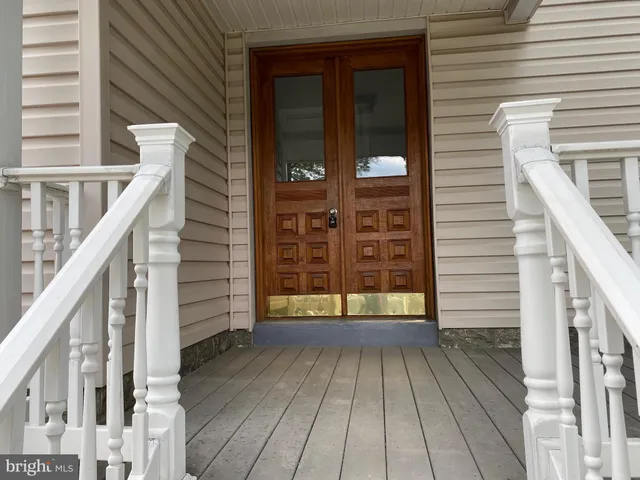 a view of outdoor space with deck and furniture