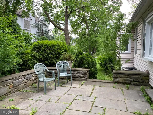 a chairs and a table in a patio