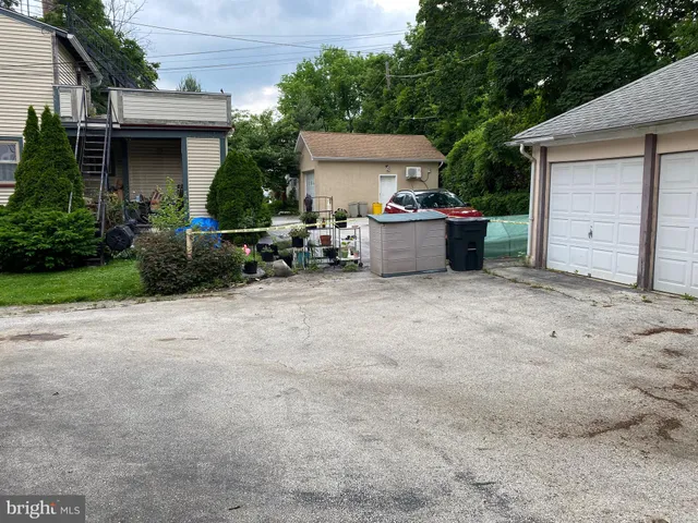a view of a house with sitting area and furniture