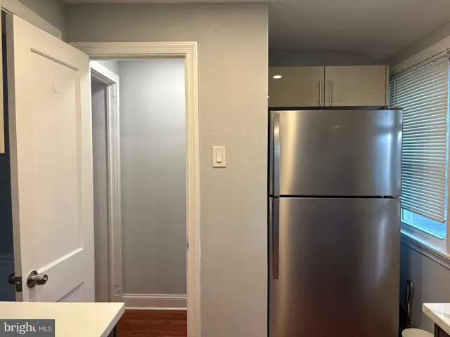 a view of a refrigerator a sink