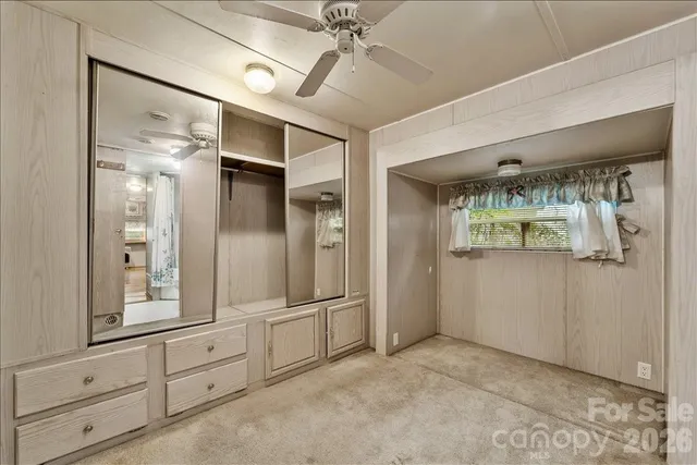 a view of a bedroom with closet