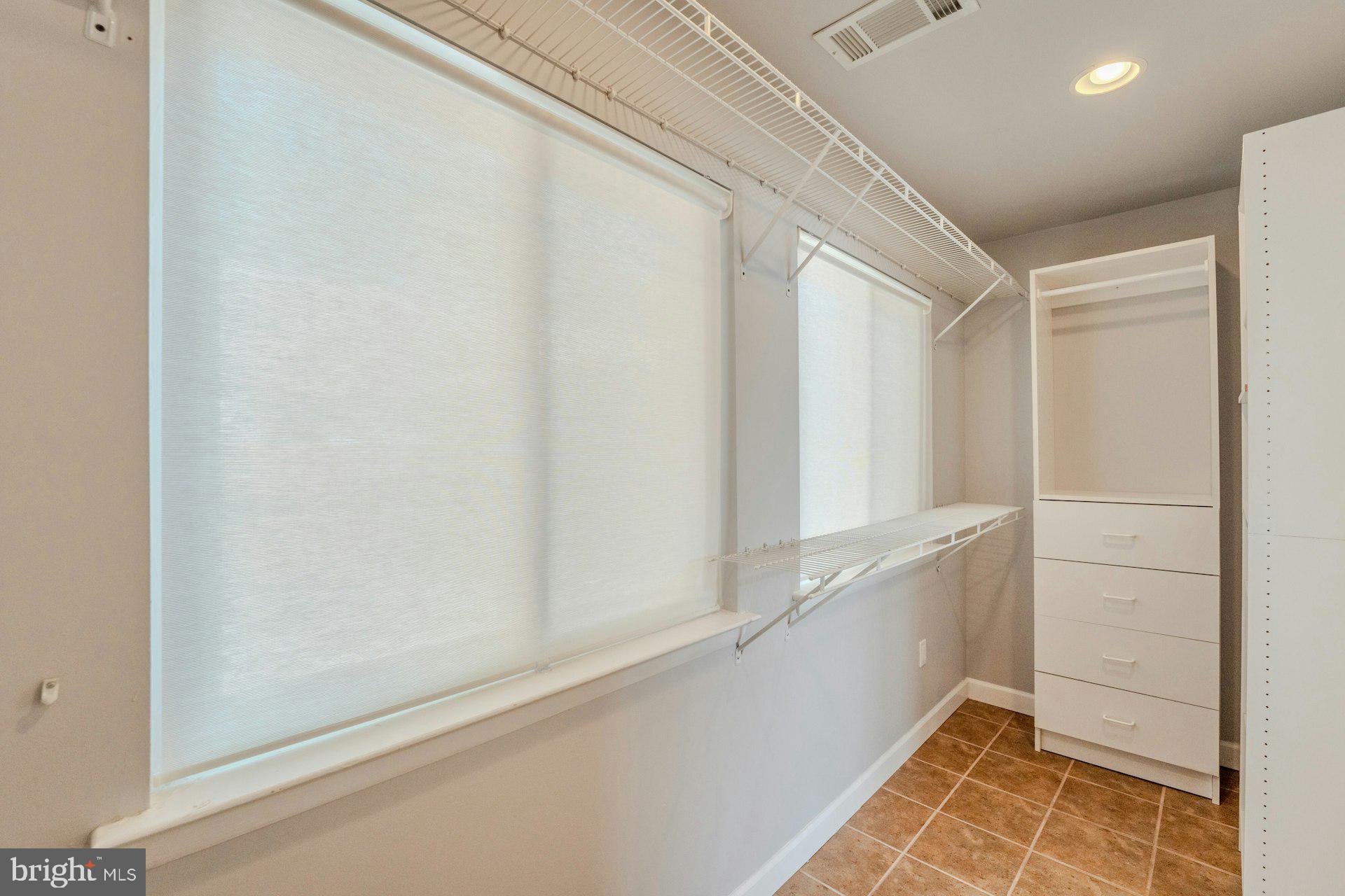 11310 Harborside Cluster Reston, VA 20191 - Photo 39 of 71 Walk in primary closet.