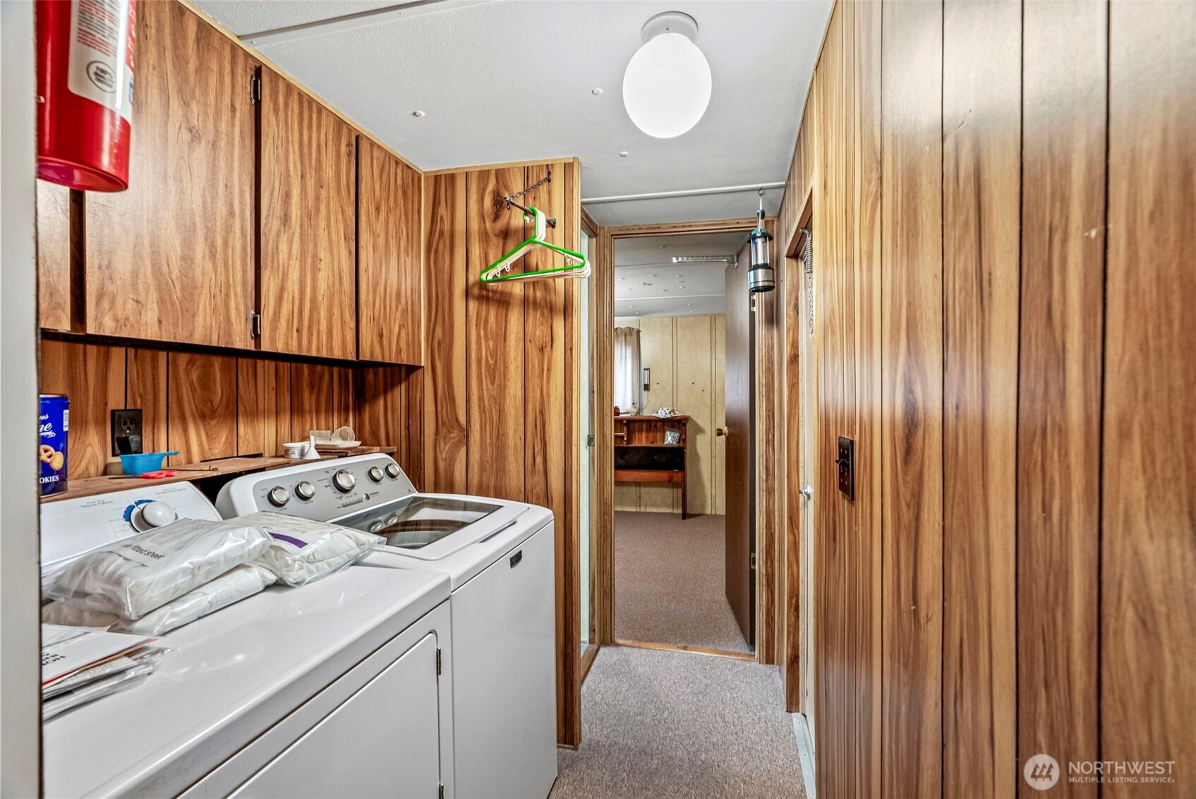 301 Henriot Road Toledo, WA 98591 - Photo 26 of 31 a storage room with washer and dryer
