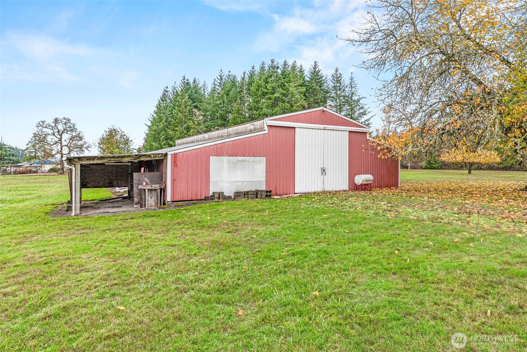 301 Henriot Road Toledo, WA 98591 - Photo 5 of 31 a house is sitting in middle od the grass