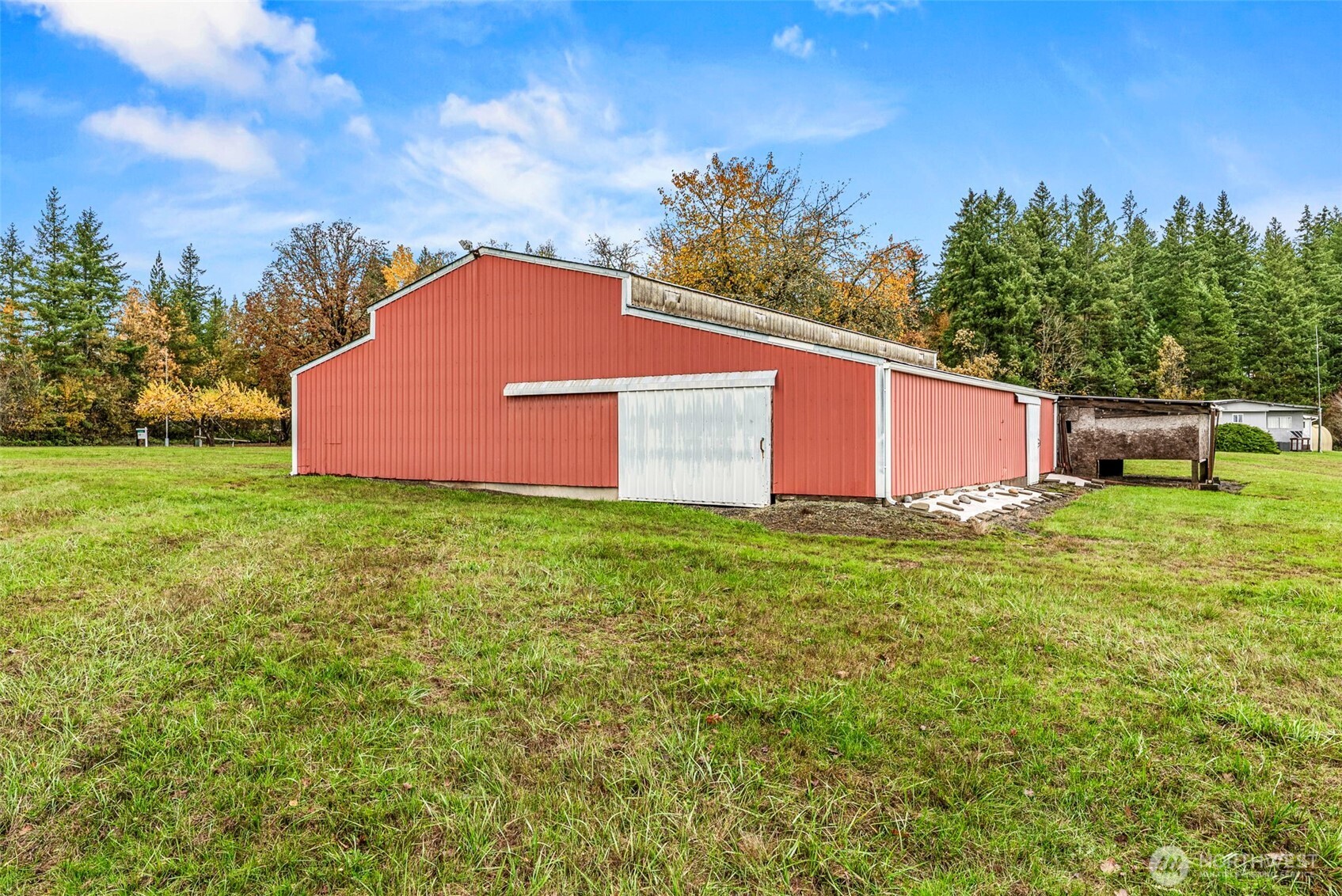 301 Henriot Road Toledo, WA 98591 - Photo 7 of 31 a view of a backyard with a garden and entertaining space