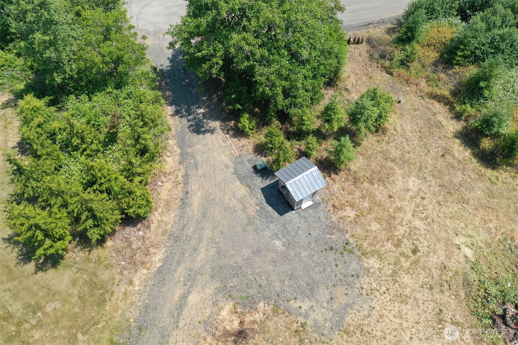 215 Sanderson Road Chehalis, WA 98532 - Photo 7 of 17 a wooden bench with a trees in the background