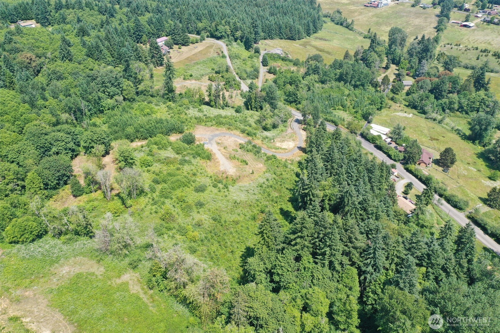 215 Sanderson Road Chehalis, WA 98532 - Photo 10 of 17 a backyard of a house with lots of green space