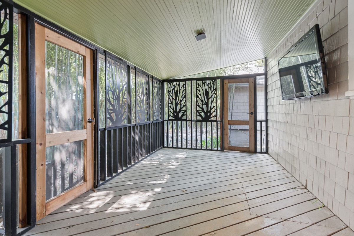 1300 Riverside Road Old Hickory, TN 37138 - Photo 28 of 40 a view of a porch with wooden floor and iron stairs