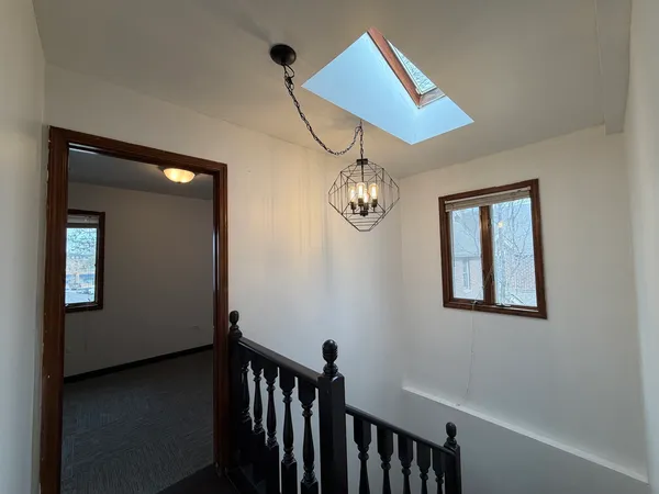 a view of a hallway with entryway