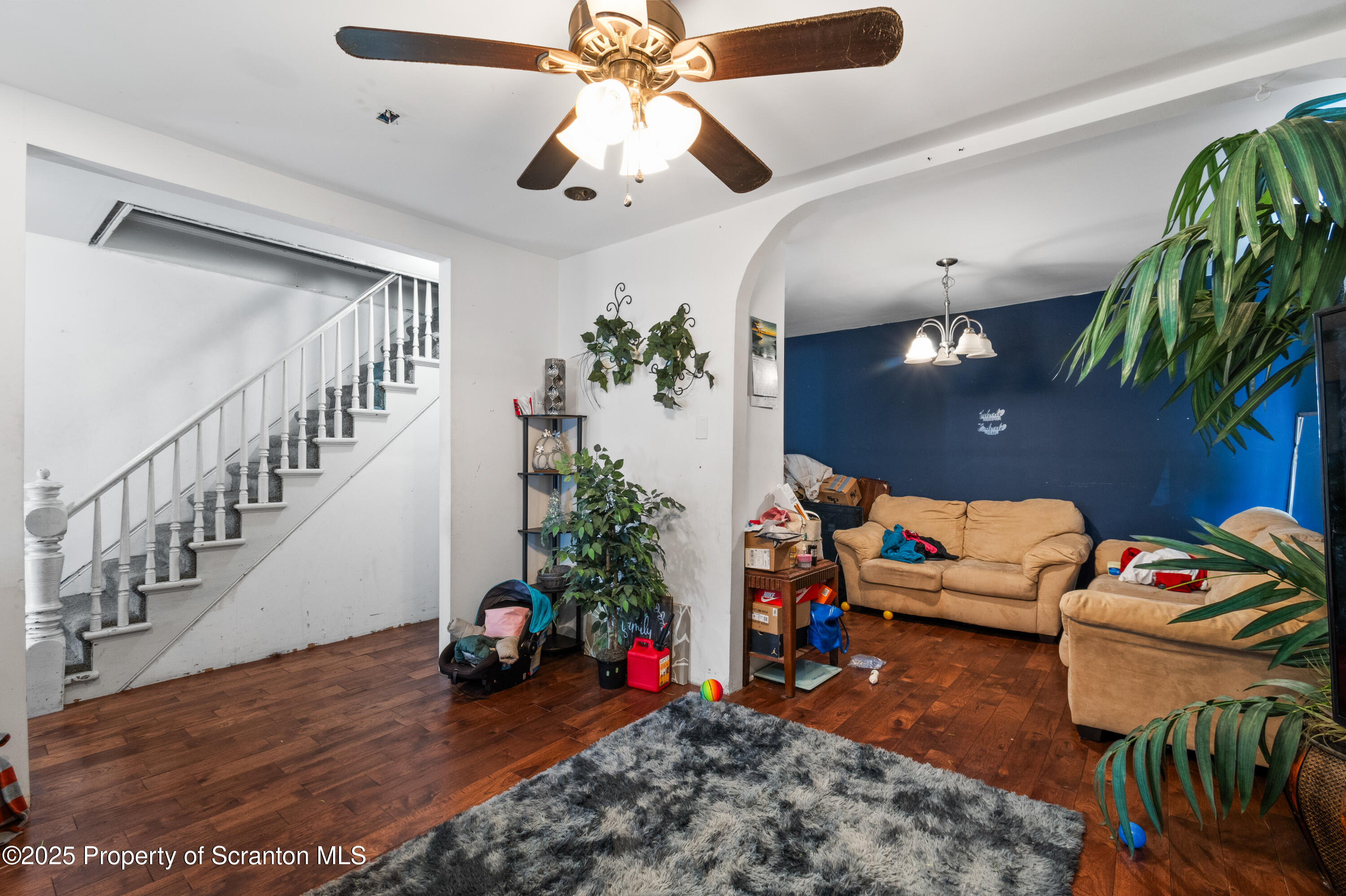613 East Locust Street Scranton, PA 18505 - Photo 8 of 20 a living room with furniture and wooden floor