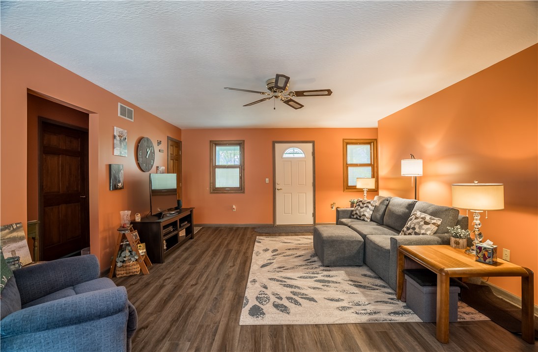 1319 Perry Road Cable, OH 43009 - Photo 9 of 44 This inviting living space features warm tones and ample natural light, perfect for everyday living.