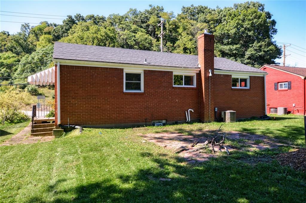 220 Fox Chapel Road Pittsburgh, PA 15238 - Photo 13 of 14 The back yard of the home offers a brick patio.