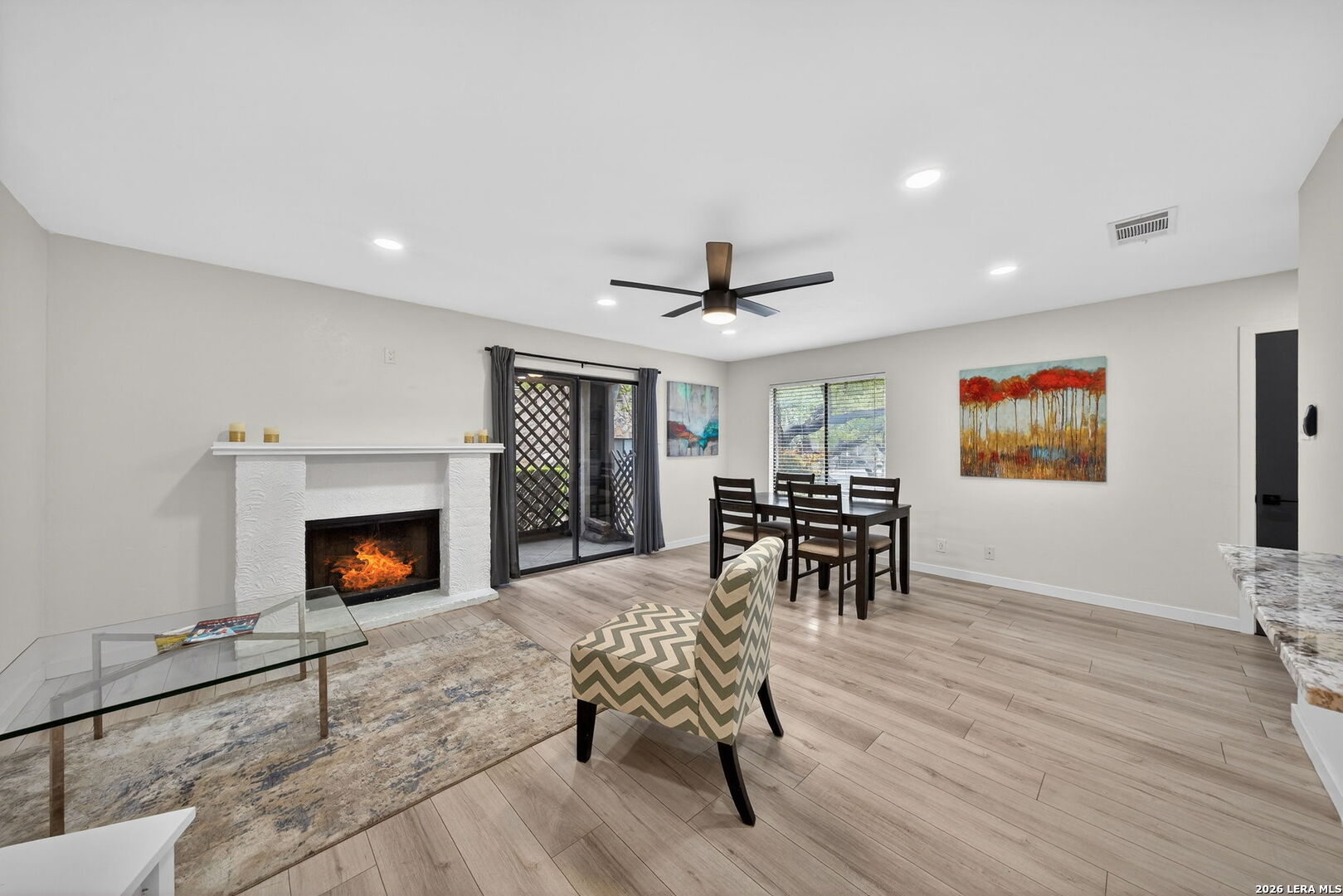 11520 Huebner Road, Unit 501 San Antonio, TX 78230 - Photo 11 of 27 a living room with furniture and a fireplace
