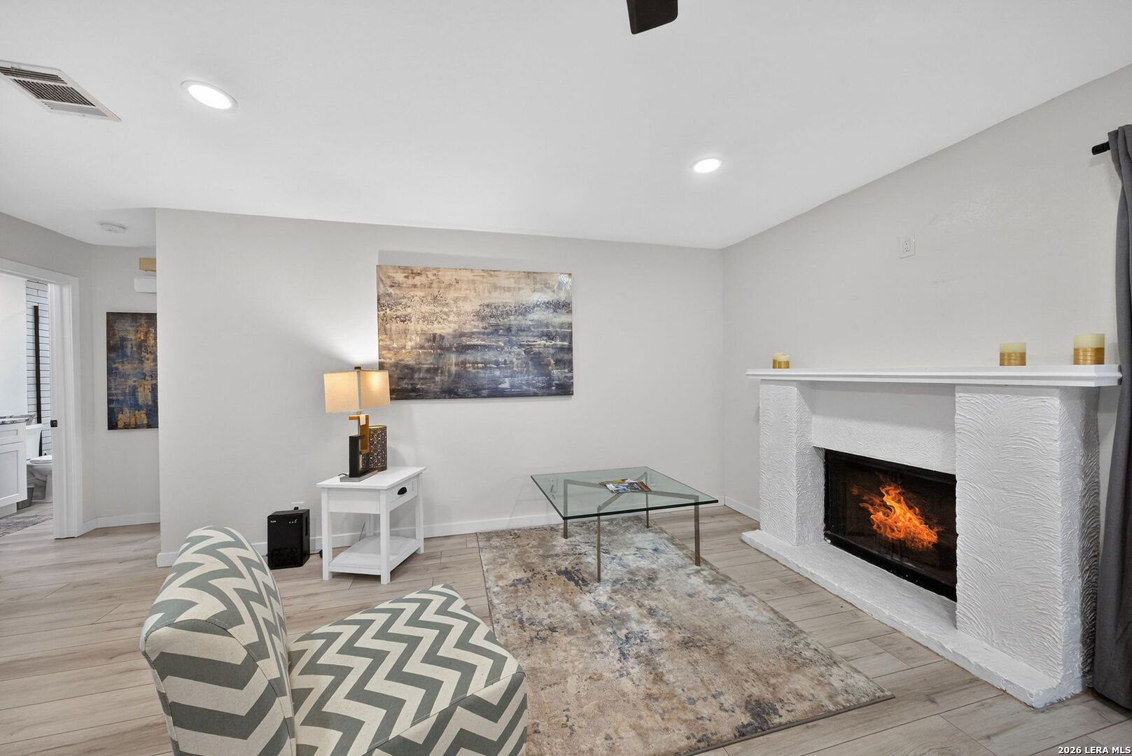 11520 Huebner Road, Unit 501 San Antonio, TX 78230 - Photo 15 of 27 a living room with furniture and a fireplace