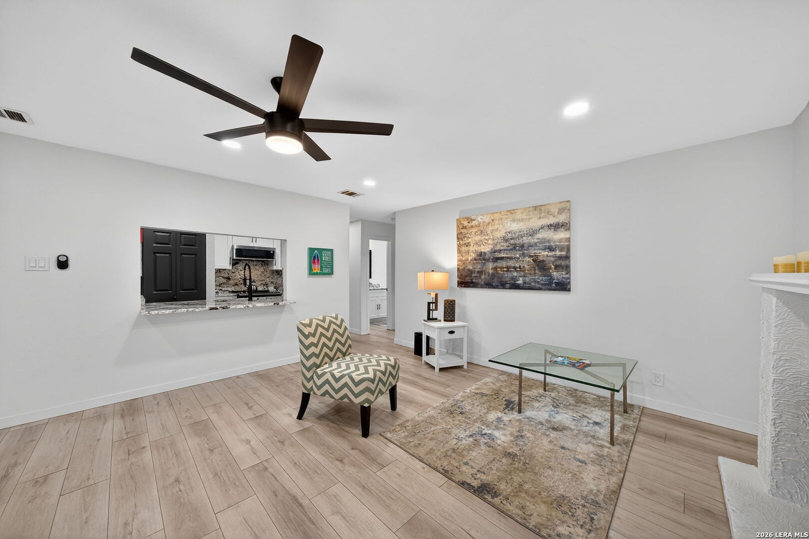 11520 Huebner Road, Unit 501 San Antonio, TX 78230 - Photo 9 of 27 a living room with furniture and a flat screen tv