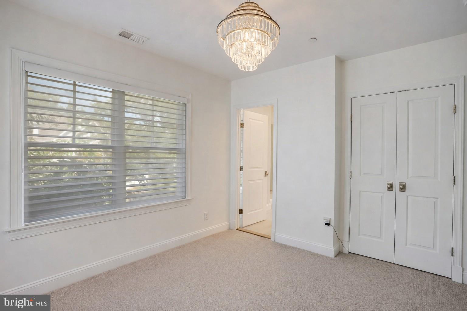 4548 Windsor Lane Bethesda, MD 20814 - Photo 14 of 39 a view of empty room with window
