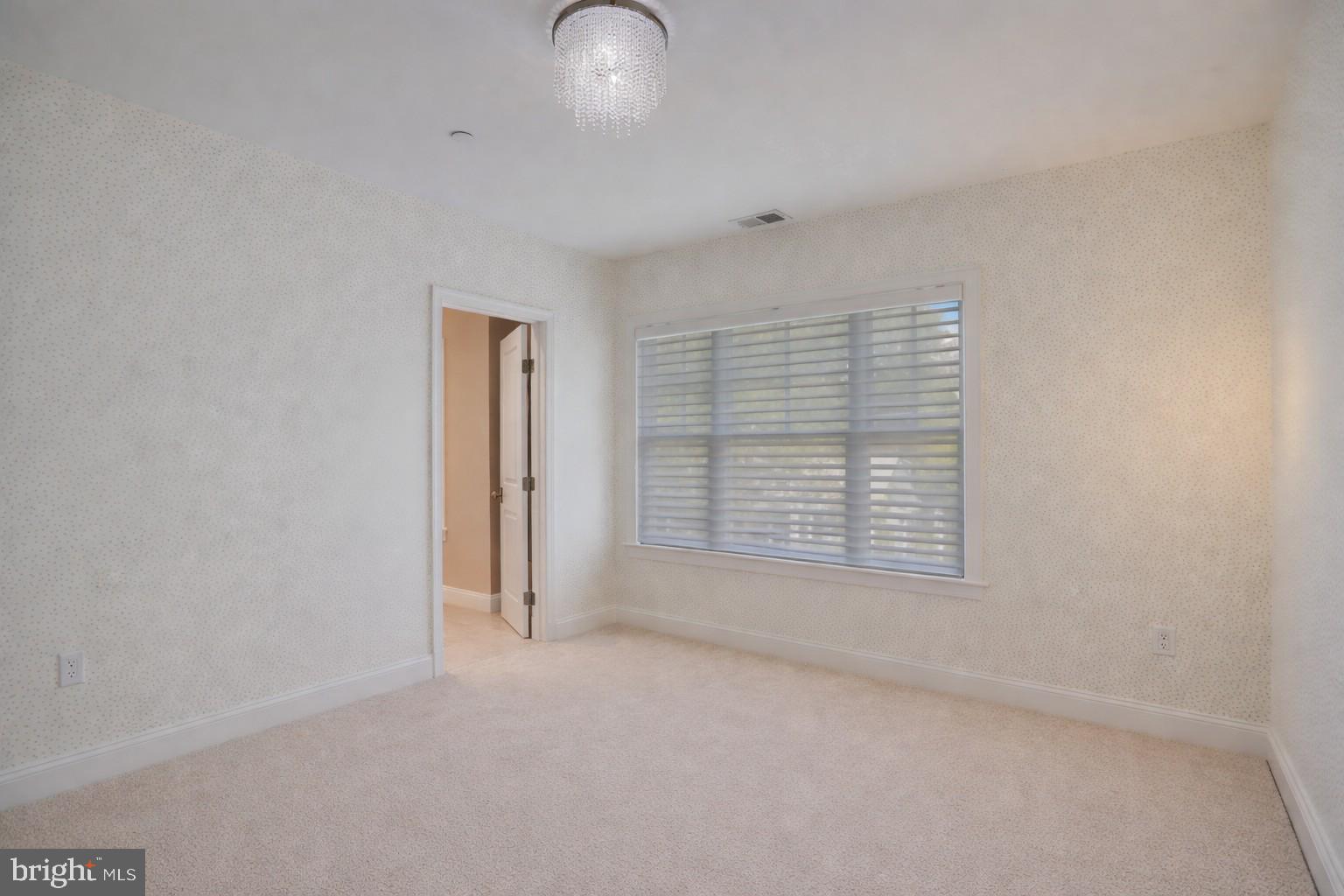 4548 Windsor Lane Bethesda, MD 20814 - Photo 17 of 39 an empty room with windows