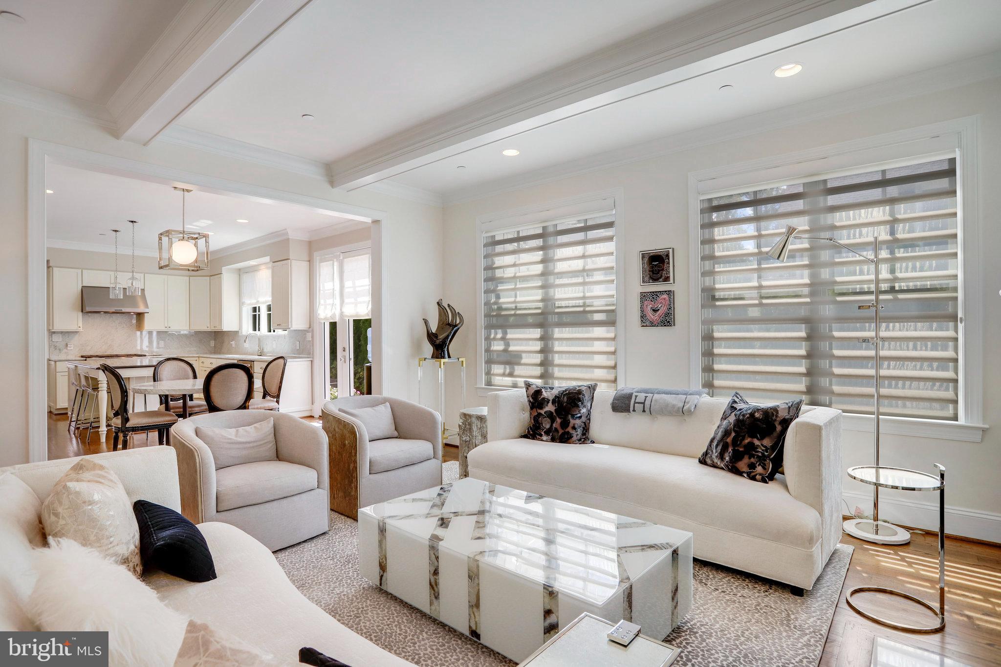 4548 Windsor Lane Bethesda, MD 20814 - Photo 3 of 39 a living room with furniture wooden floor and a large window