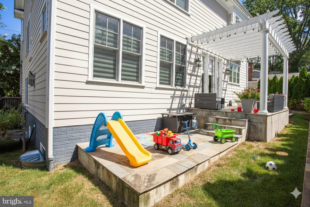 4548 Windsor Lane Bethesda, MD 20814 - Photo 33 of 39 a view of backyard with a patio