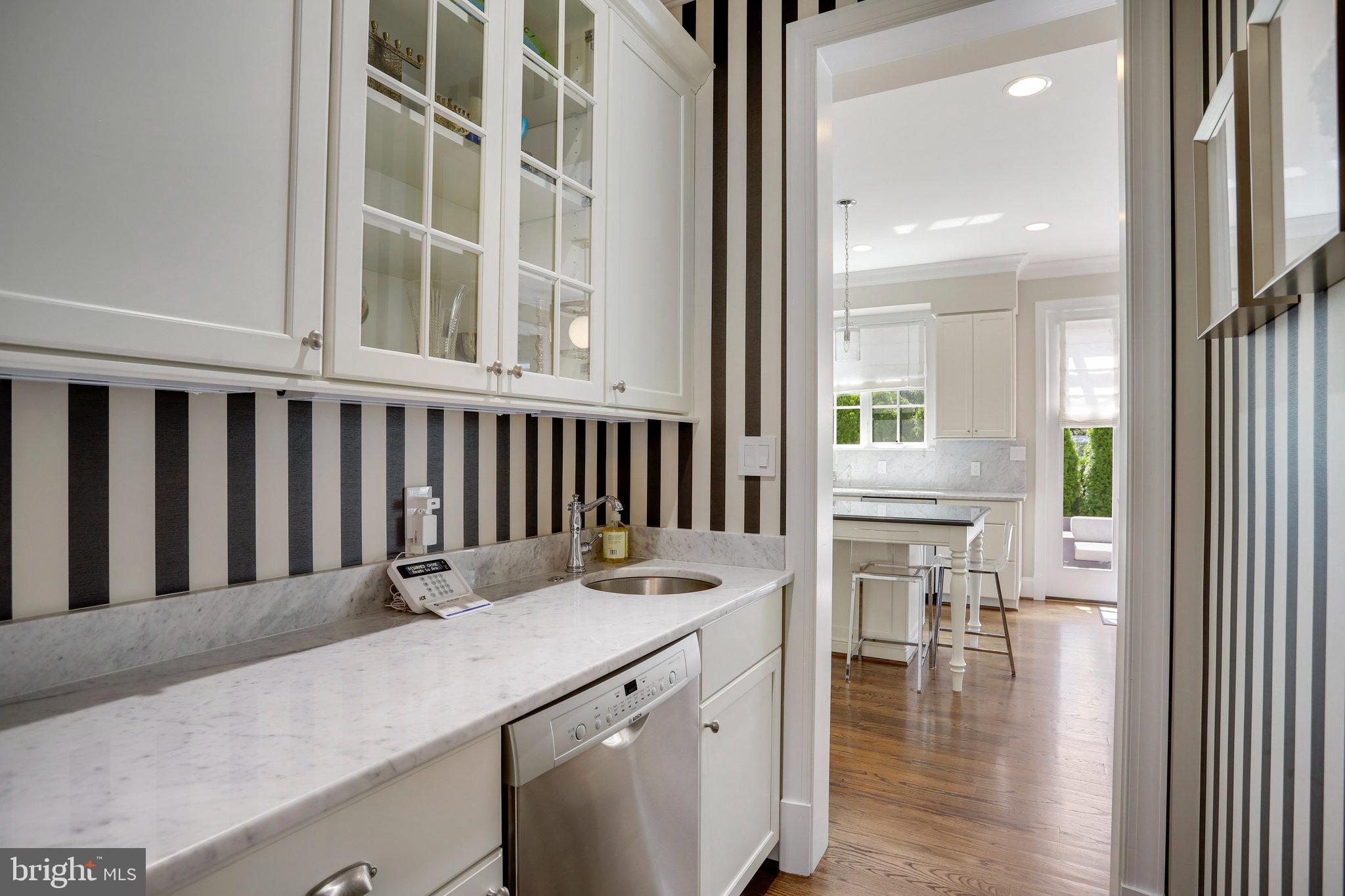4548 Windsor Lane Bethesda, MD 20814 - Photo 6 of 39 en suite bathroom with a sink and a large window