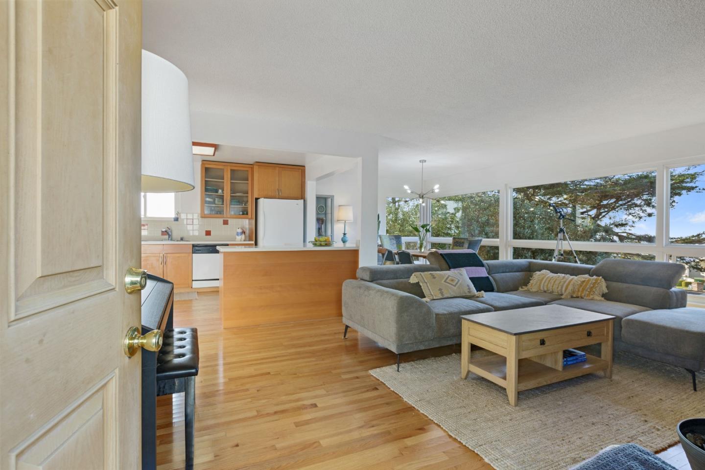 107 Crestmoor Circle Pacifica, CA 94044 - Photo 14 of 45 a living room with furniture and a flat screen tv