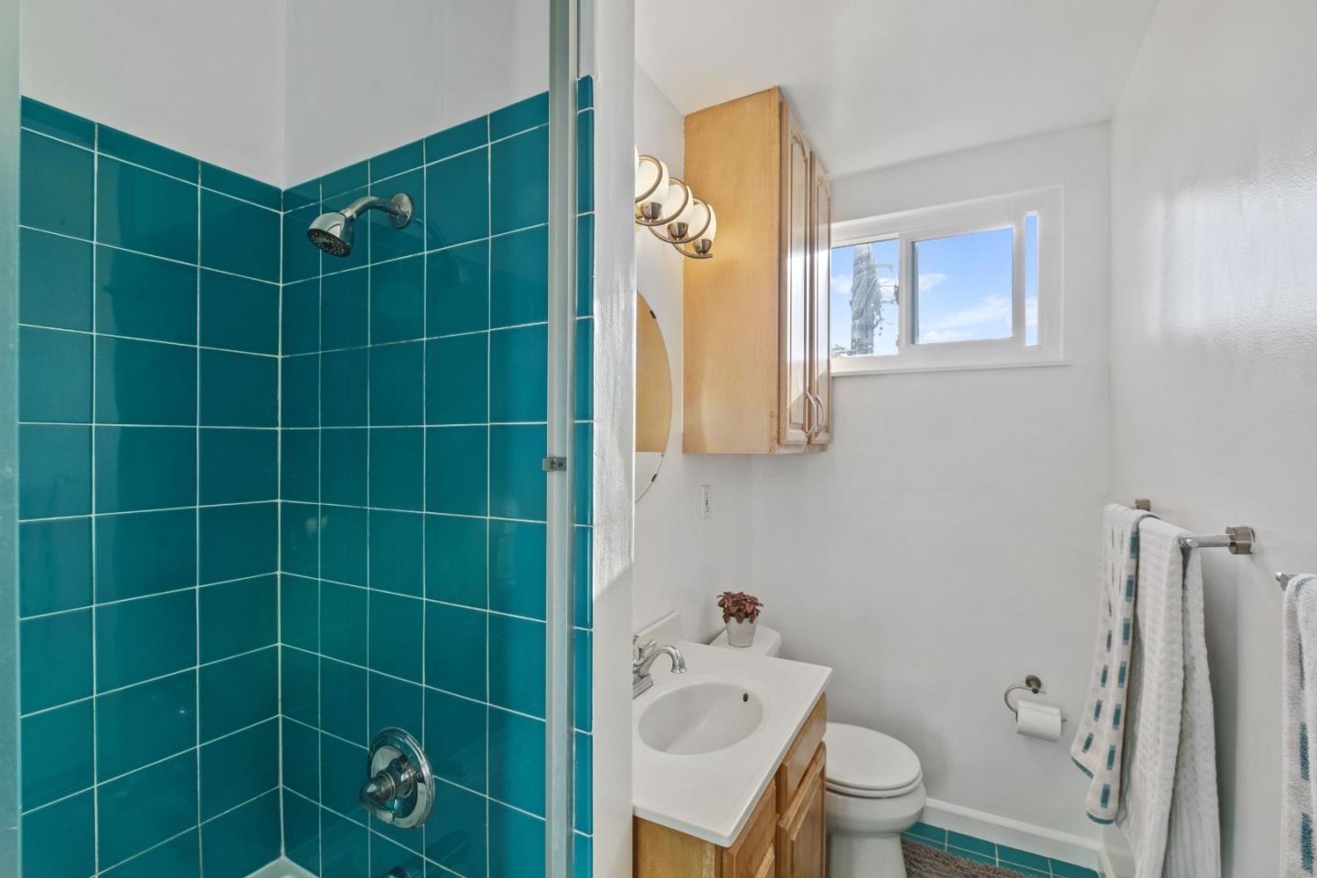 107 Crestmoor Circle Pacifica, CA 94044 - Photo 29 of 45 a bathroom with a toilet and a shower