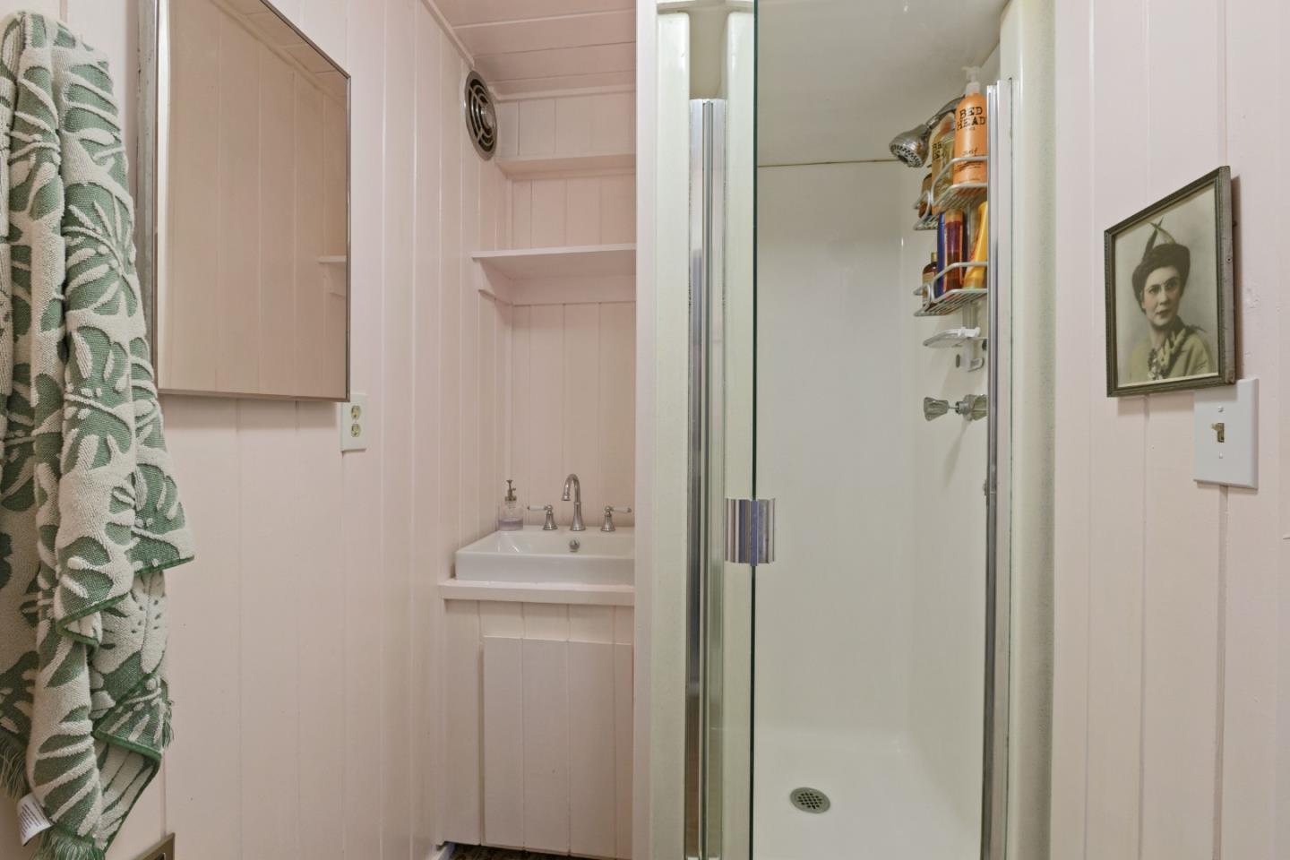 107 Crestmoor Circle Pacifica, CA 94044 - Photo 30 of 45 a bathroom with a sink toilet and vanity