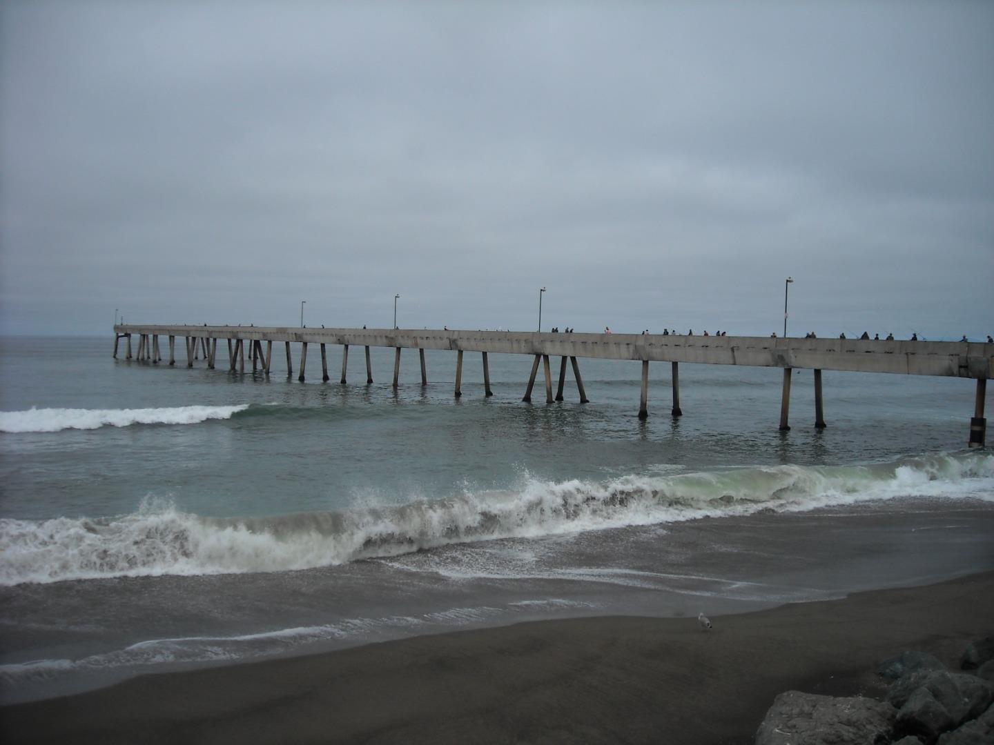 107 Crestmoor Circle Pacifica, CA 94044 - Photo 39 of 45 a view of a swimming pool with a table and chairs