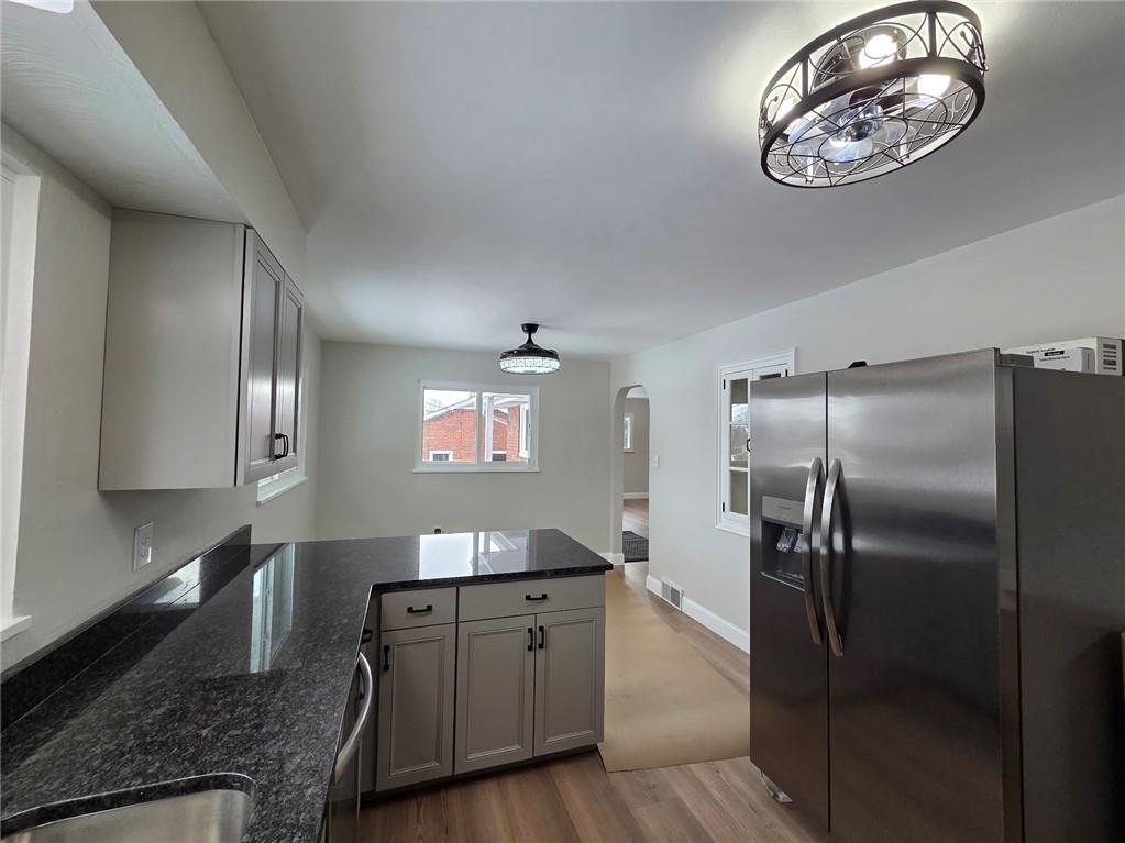 265 North Duffy Road Butler, PA 16001 - Photo 12 of 41 a kitchen with stainless steel appliances granite countertop a sink and refrigerator