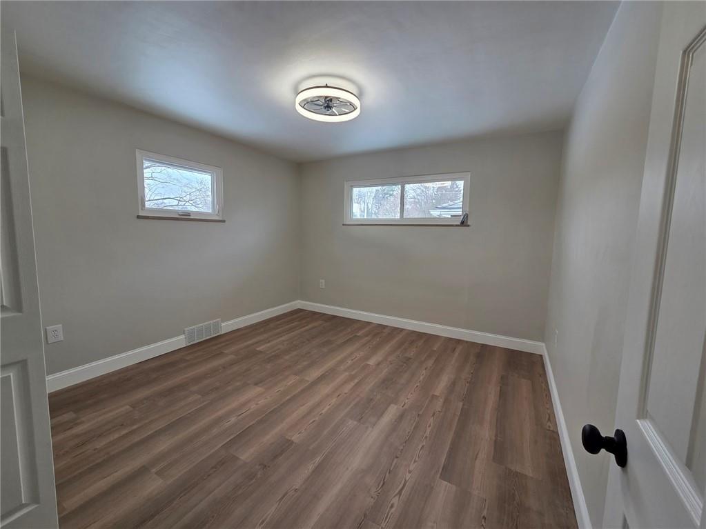 265 North Duffy Road Butler, PA 16001 - Photo 24 of 41 a view of a room with wooden floor and window