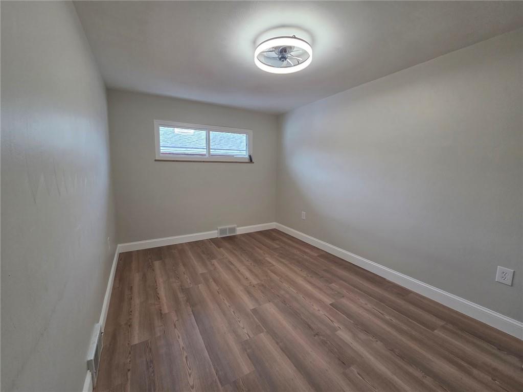 265 North Duffy Road Butler, PA 16001 - Photo 26 of 41 a view of a room with wooden floor and windows