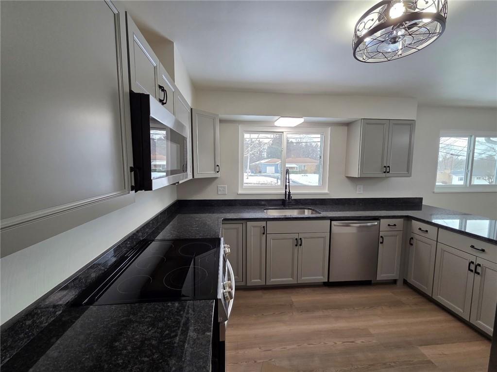 265 North Duffy Road Butler, PA 16001 - Photo 8 of 41 a kitchen with a sink and a stove top oven