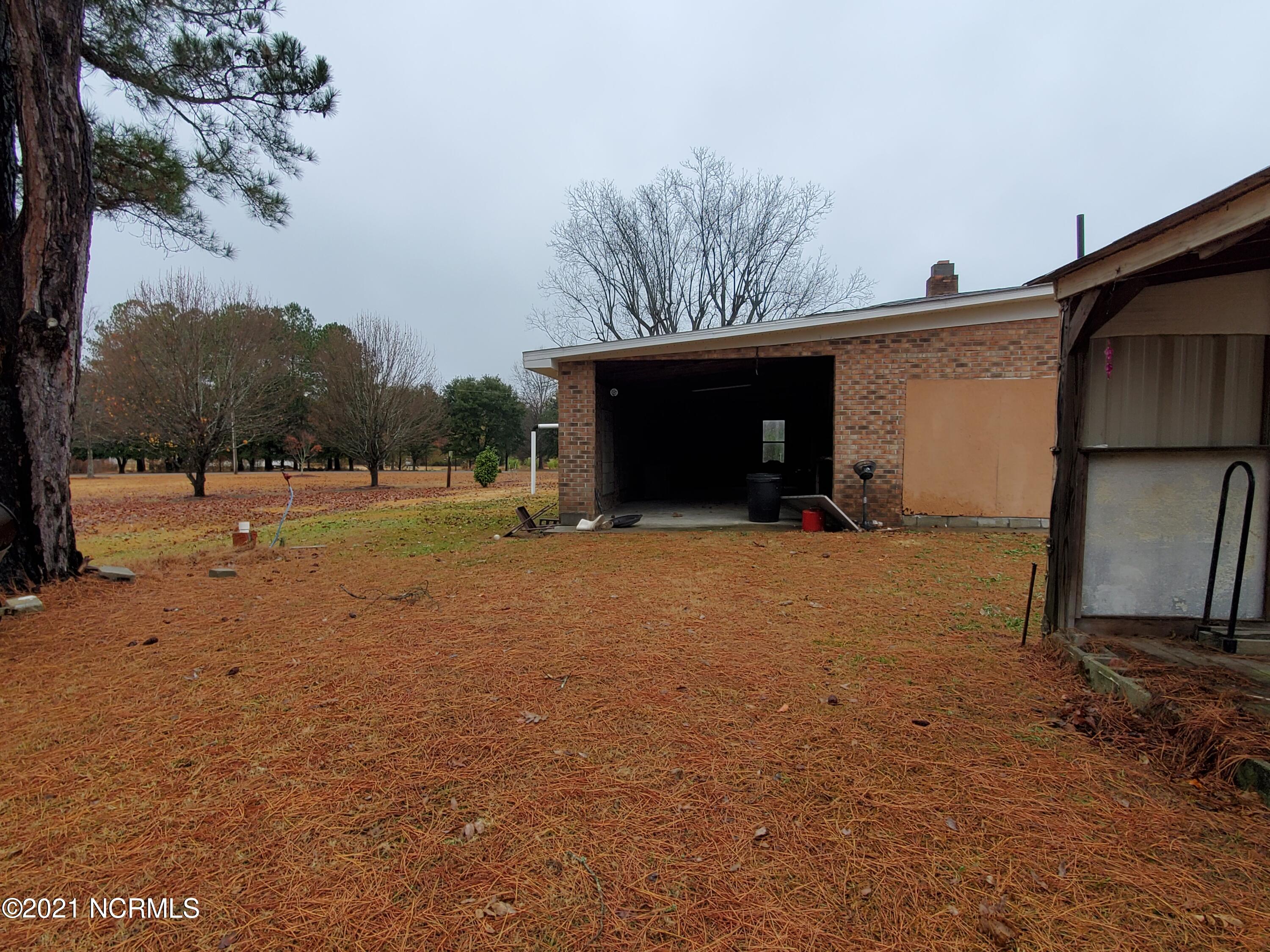 3734 Ernest Loftin Road Ayden, NC 28513 - Photo 24 of 25 Back Door Carport