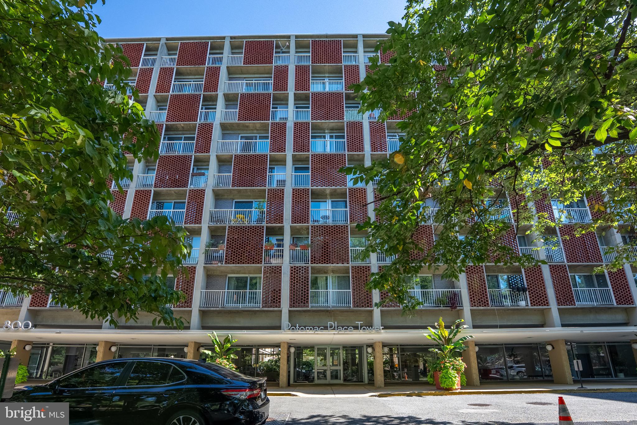 a front view of a building with street view