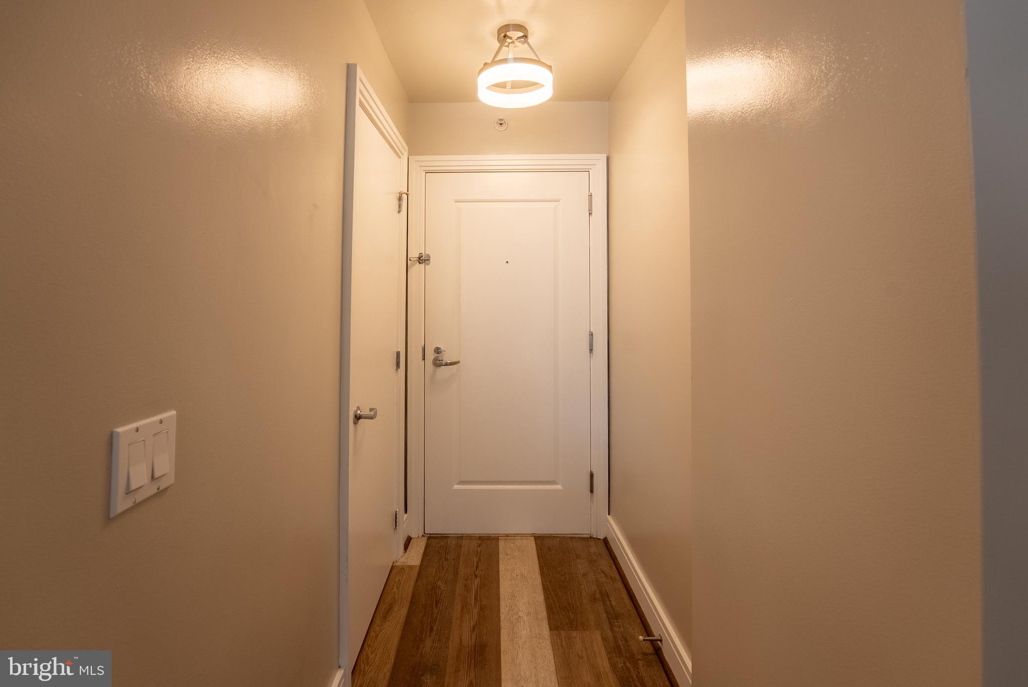 800 4th Street Southwest, Unit N312 Washington, DC 20024 - Photo 13 of 16 a bathroom with a sink and a mirror
