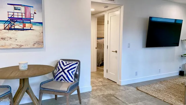 a view of entryway with livingroom and furniture