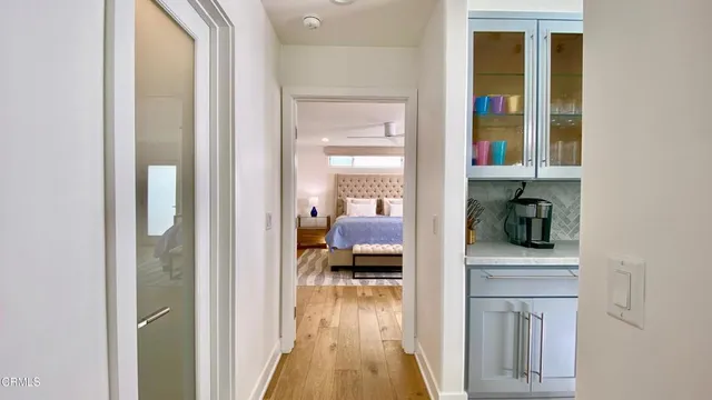 a living room with furniture rug and window