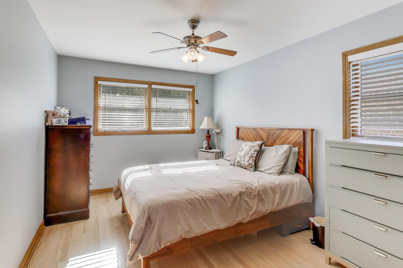 Undisclosed Address Chicago, IL 60655 - Photo 13 of 25 a bedroom with a bed and a window