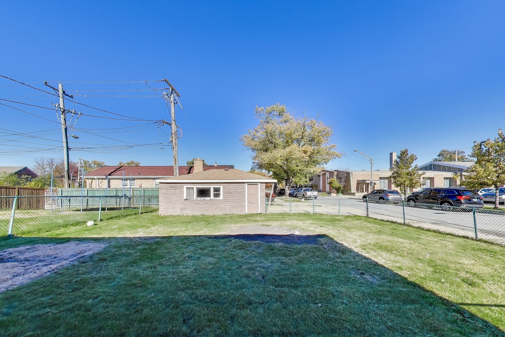 Undisclosed Address Chicago, IL 60655 - Photo 20 of 25 a view of a house with a big yard