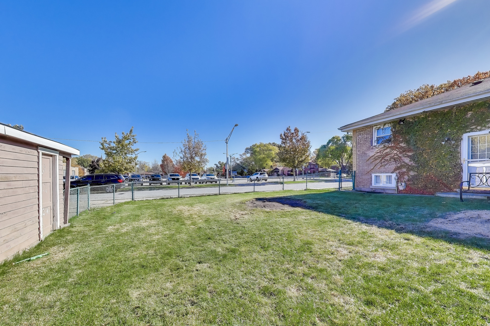 Undisclosed Address Chicago, IL 60655 - Photo 24 of 25 a view of a swimming pool and a yard