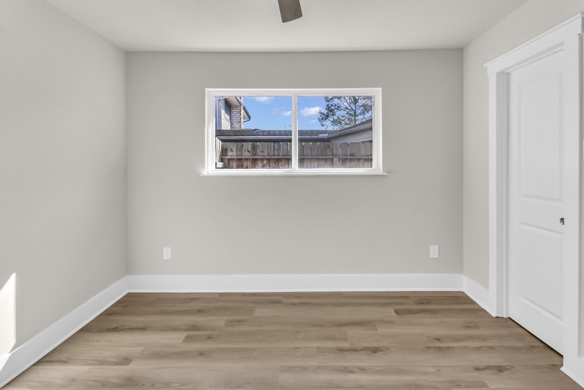 11630 Sagewillow Lane Houston, TX 77089 - Photo 19 of 25 a view of a room with wooden floor and cabinet